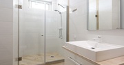Clear & Elegant: The Perfect Frameless Shower Glass Solution